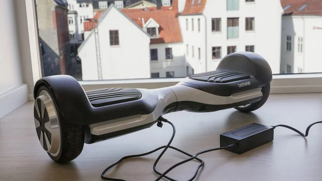 Need A New Hoverboard Charger? Your Safe Buying Guide 4 Charging a hoverboard on a safe surface