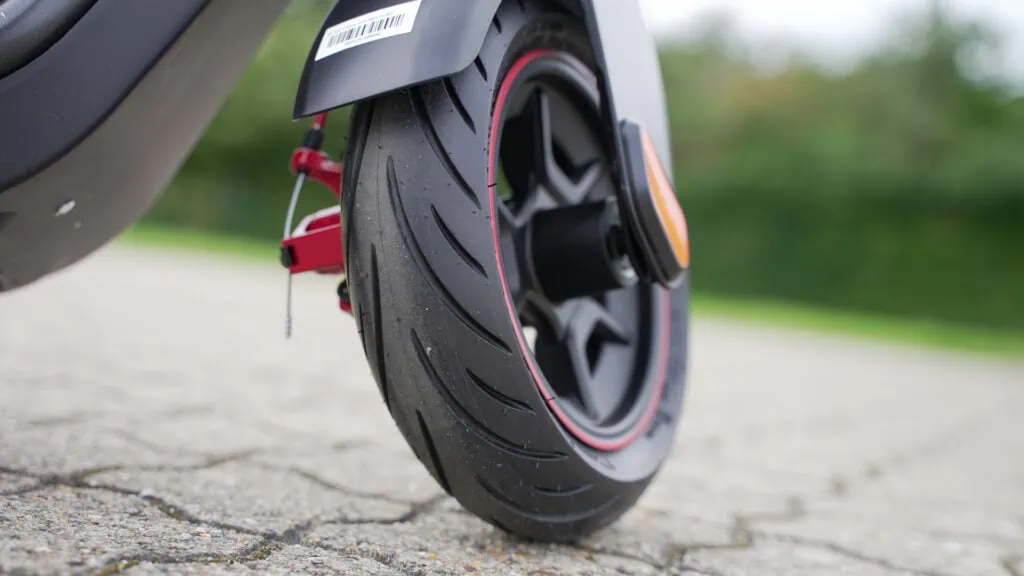 NIU KQi3 Max Review: Gold Standard of Commuter Scooters 49 Closeup of front tire on NIU KQi3 Max