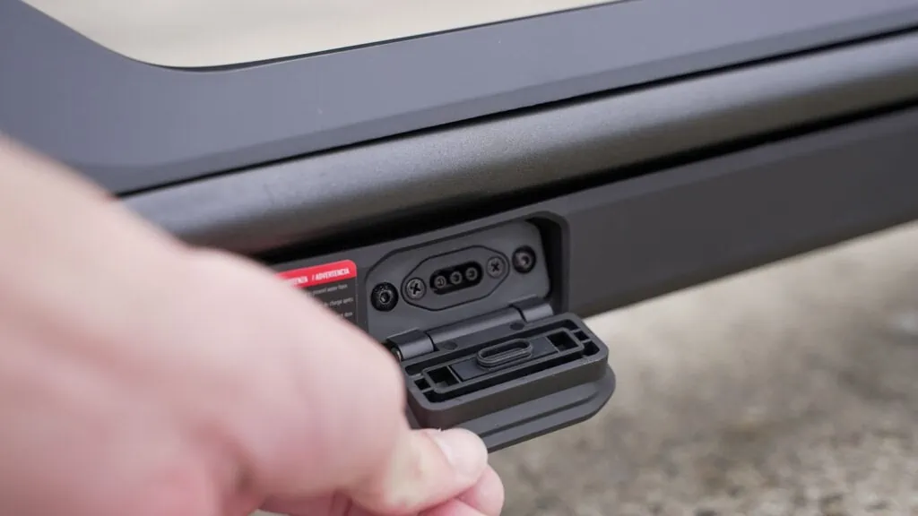 NIU KQi3 Pro Review: A Level-Up For Commuter Scooters 50 Closeup of the charging port in the NIU KQi3 Pro