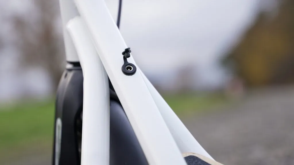 Fluid CityRider Review: Light Weight, High Value 39 Closeup of the charging port on the Fluid CityRider