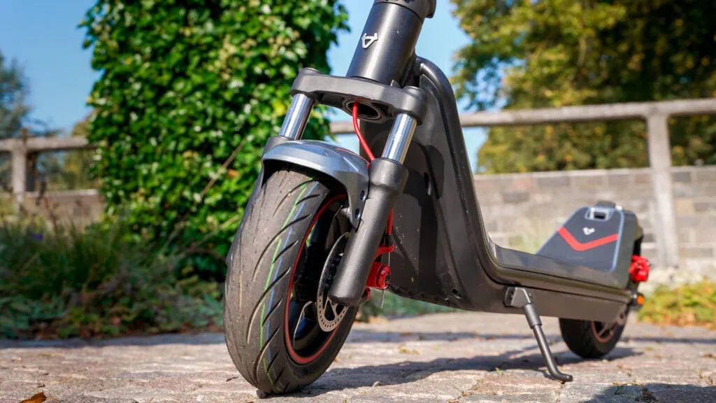 NIU KQi 300X Review: Rides Like a Dream, Built Like a Tank 18 NIU KQI 300X front fork suspension and tire