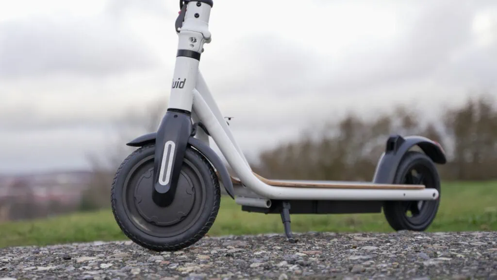 Fluid CityRider Review: Light Weight, High Value 37 Photo of the FluidFreeRide CityRider electric scooter with the front wheel hub motor in focus