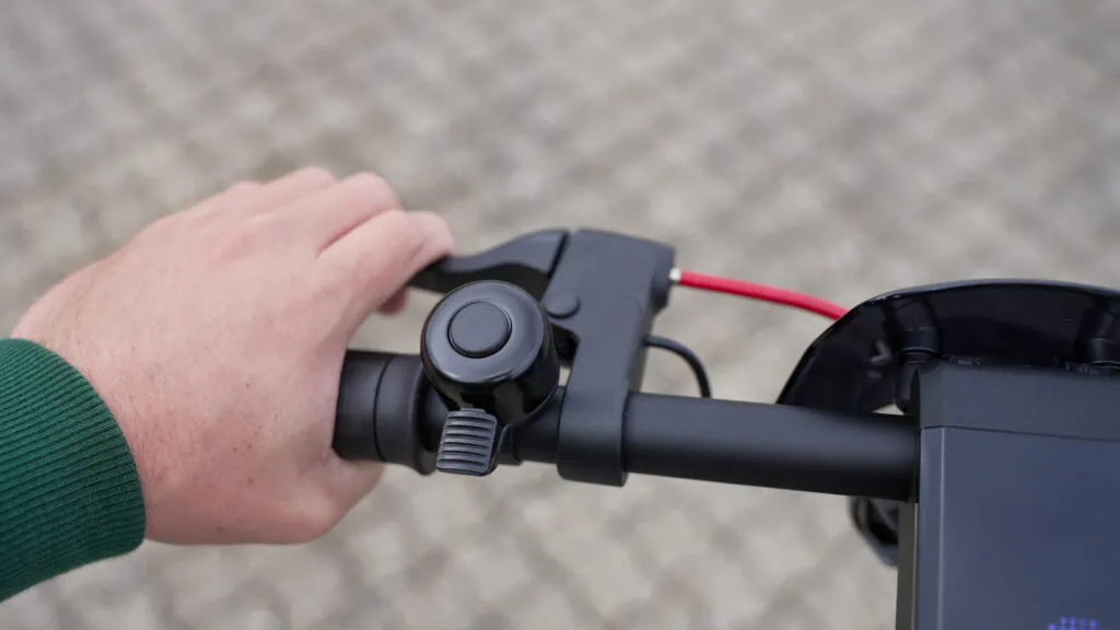 NIU KQi3 Max Review: Gold Standard of Commuter Scooters 56 Pressing the left brake lever on the NIU KQi3 Max