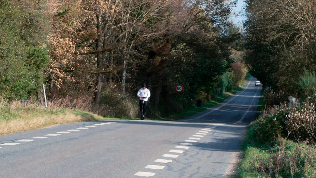 Buying Guide: How To Choose an Electric Scooter 4 Riding an electric scooter up a steep hill